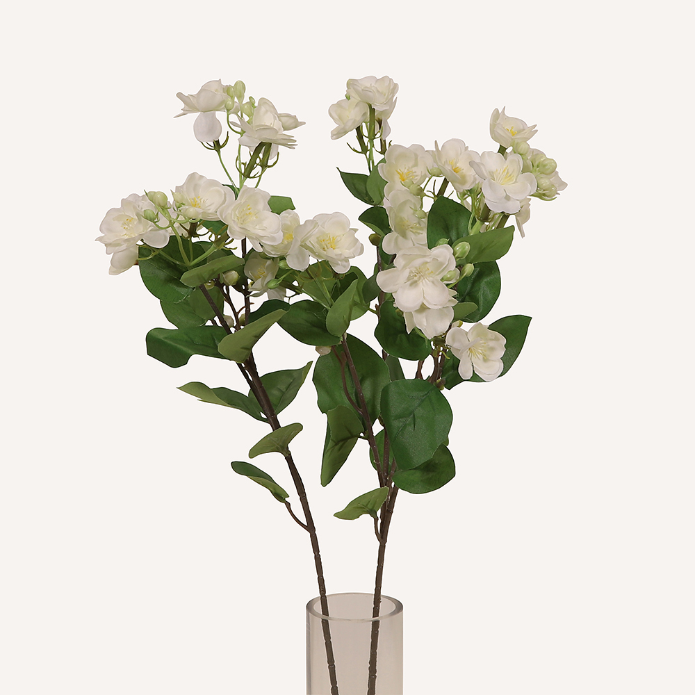 En elegant Jasmin vit Takai, Konstgjord jasmin 62 cm hög med naturligt utseende och känsla. Detaljerad utformning med realistiskt bladverk. 