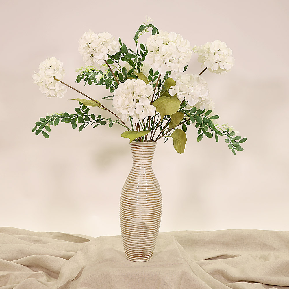 En elegant Sophorae vit snittgrönt, Konstgjord sophorae snittgrönt 80 cm hög med naturligt utseende och känsla. Detaljerad utformning med realistiskt bladverk. 