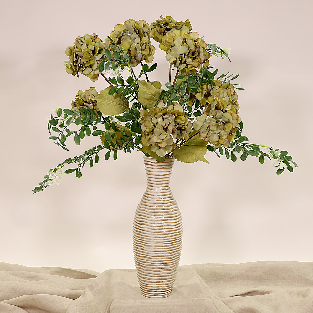 En elegant Sophorae vit snittgrönt, Konstgjord sophorae snittgrönt 80 cm hög med naturligt utseende och känsla. Detaljerad utformning med realistiskt bladverk. 