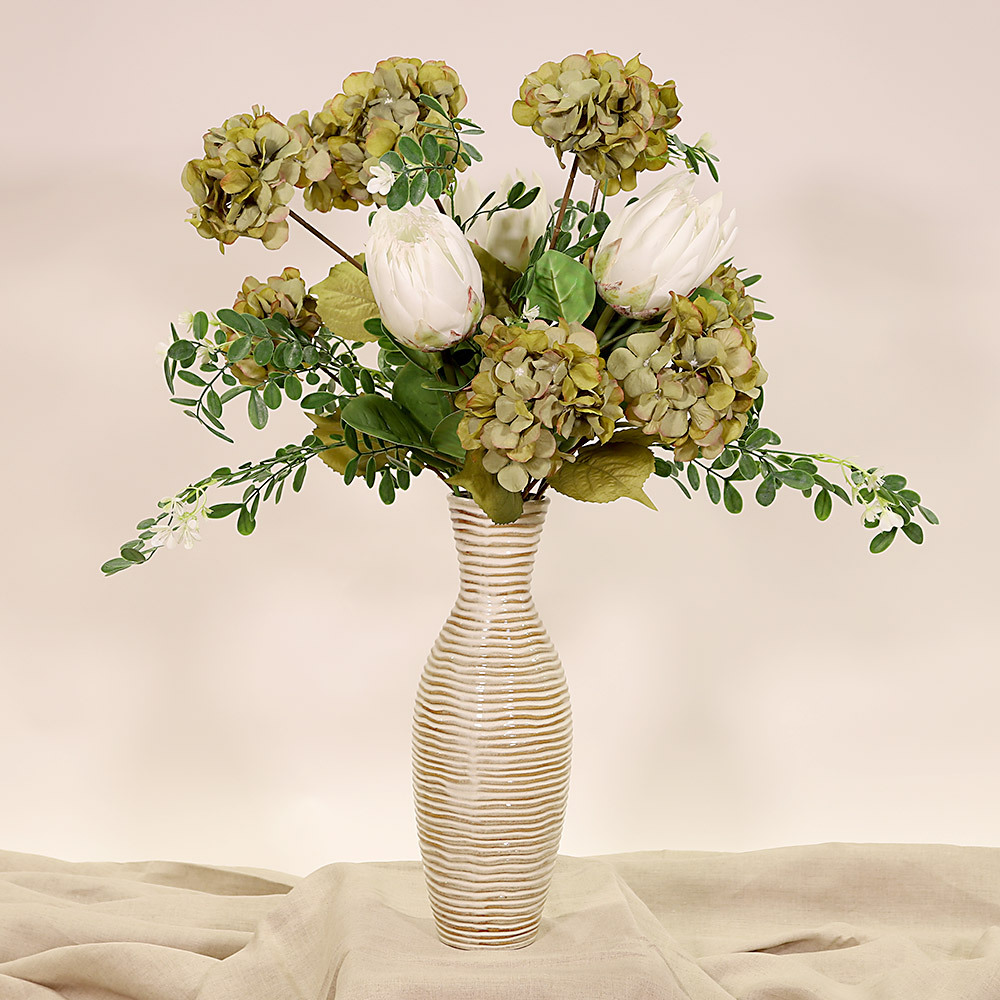 En elegant Sophorae vit snittgrönt, Konstgjord sophorae snittgrönt 80 cm hög med naturligt utseende och känsla. Detaljerad utformning med realistiskt bladverk. 